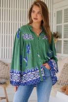 Model wears rayon Boho blouse with vintage print - feminine & effortless