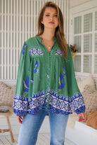 Model wears rayon Boho blouse with vintage print - feminine & effortless