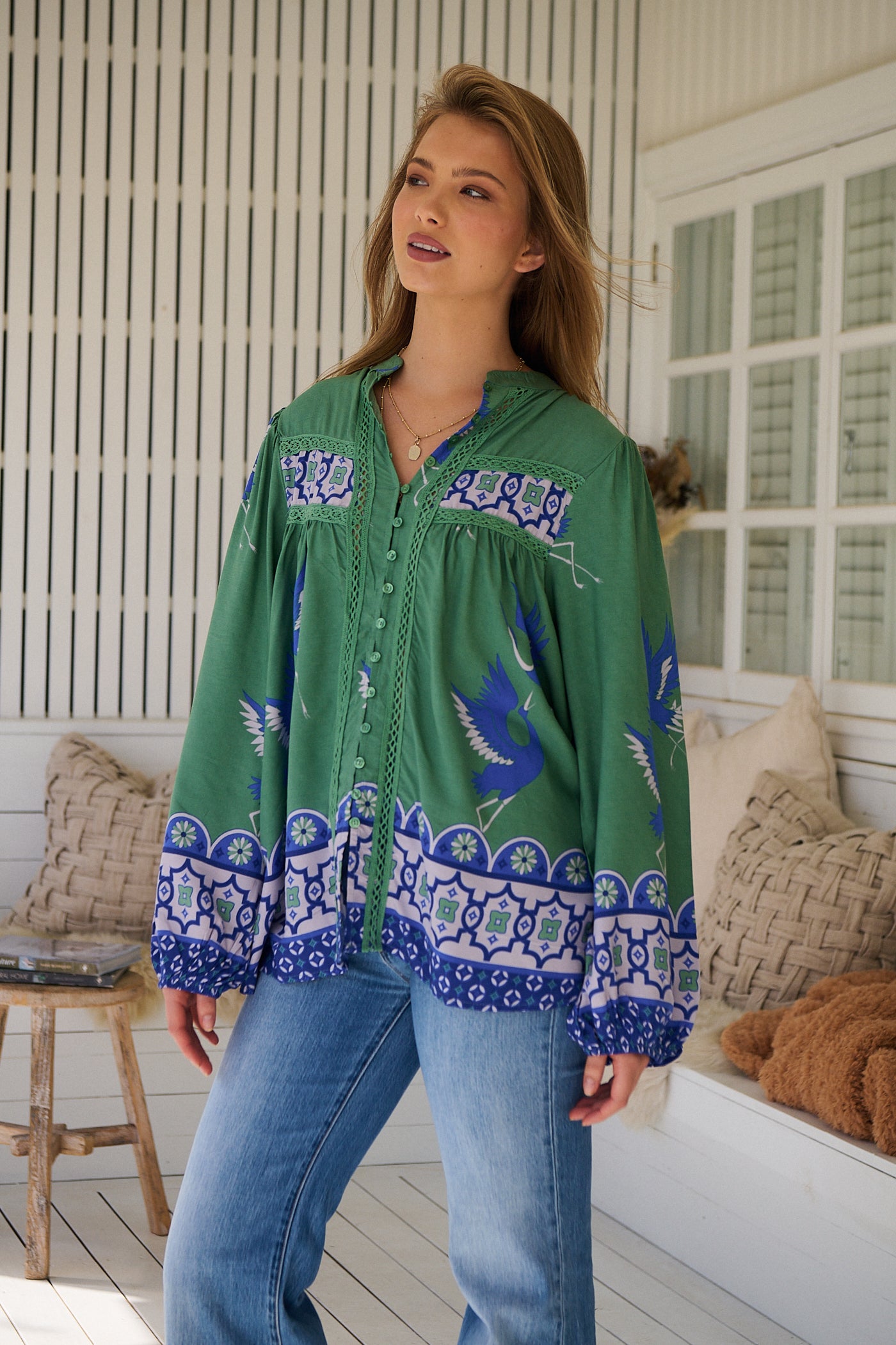 Model wears rayon Boho blouse with vintage print - feminine & effortless