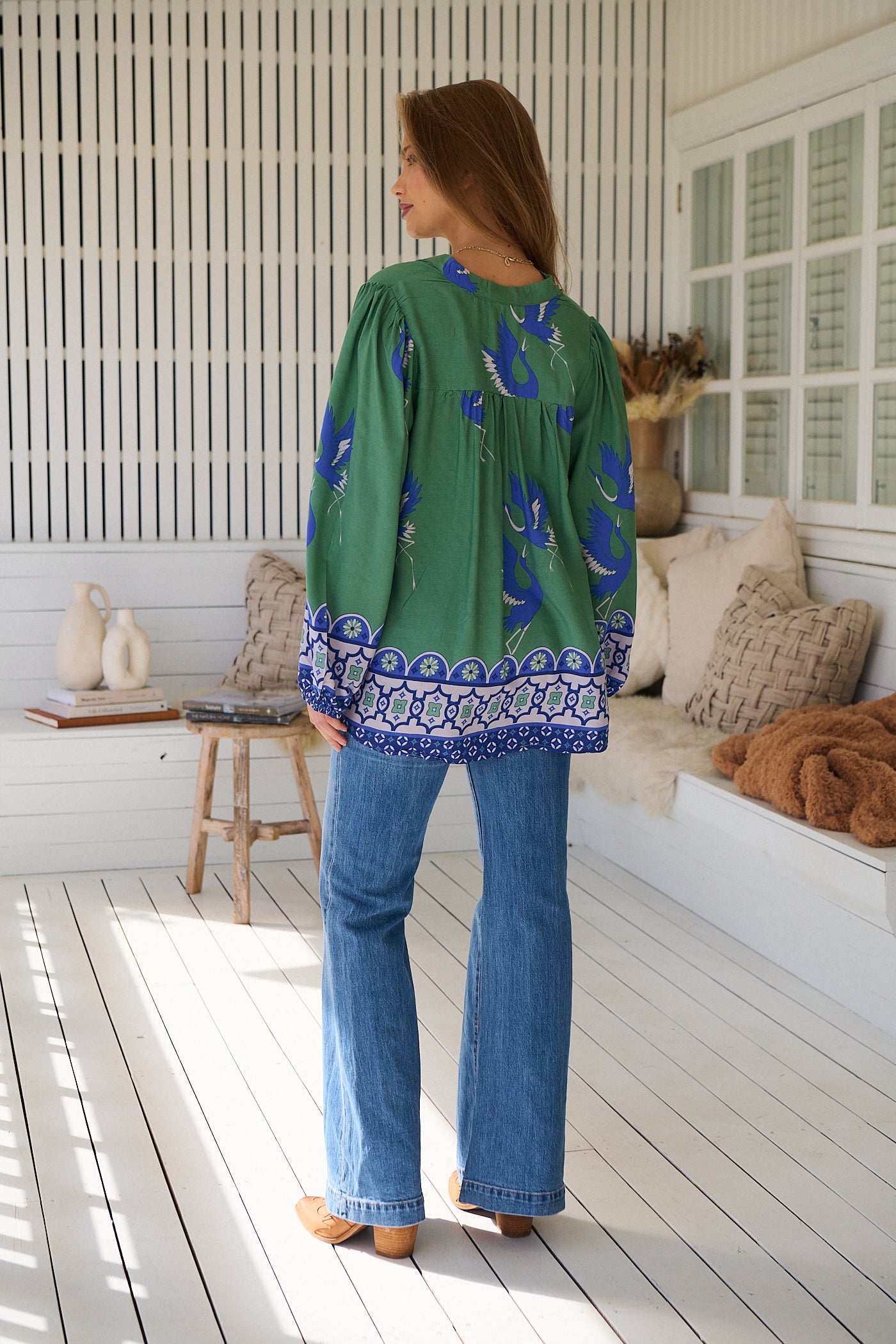 Model wears rayon Boho blouse with vintage print - feminine & effortless