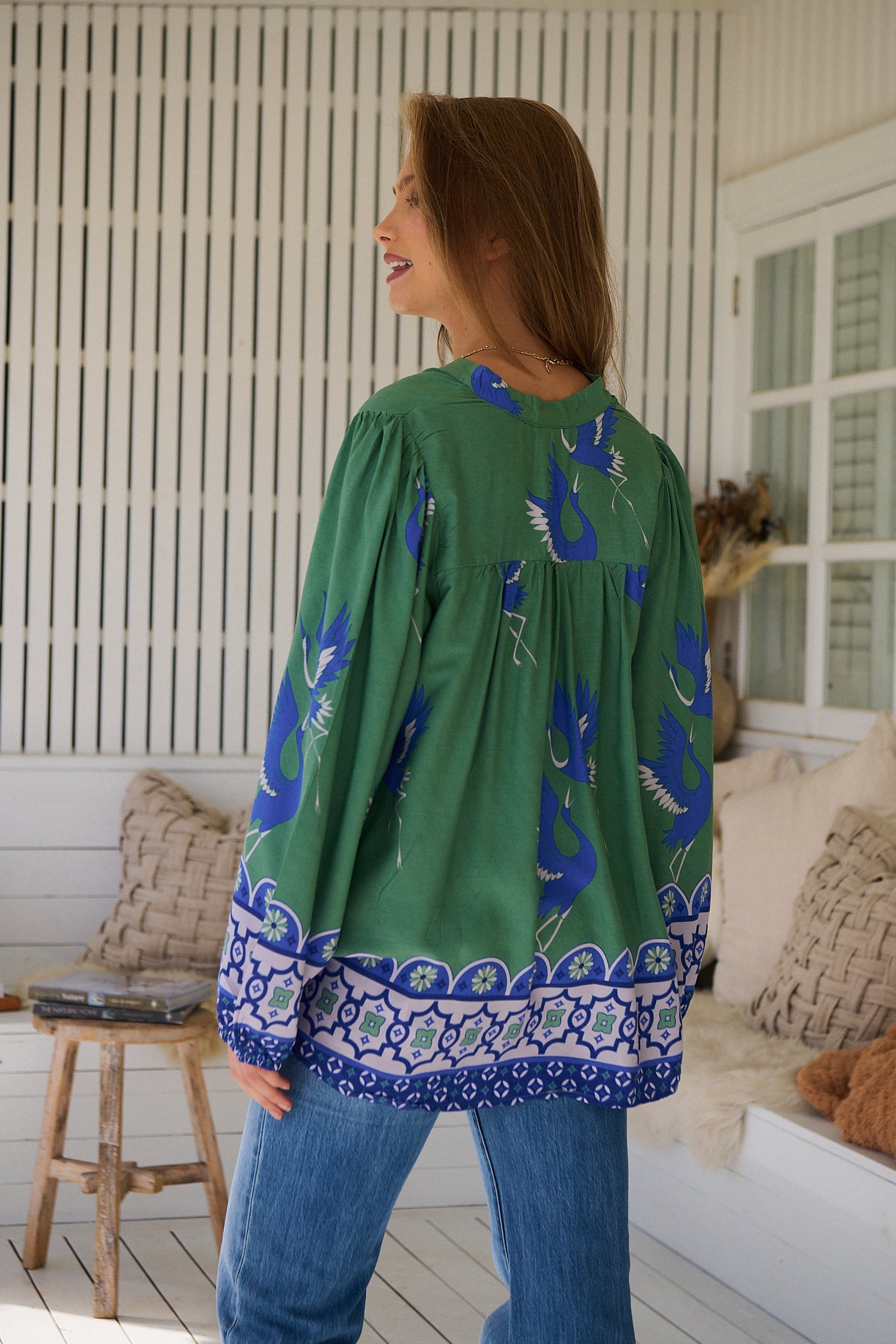 Model wears rayon Boho blouse with vintage print - feminine & effortless