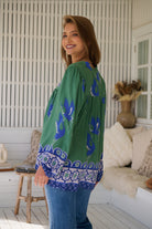 Model wears rayon Boho blouse with vintage print - feminine & effortless