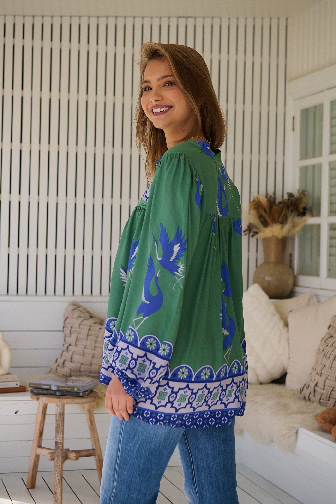 Model wears rayon Boho blouse with vintage print - feminine & effortless
