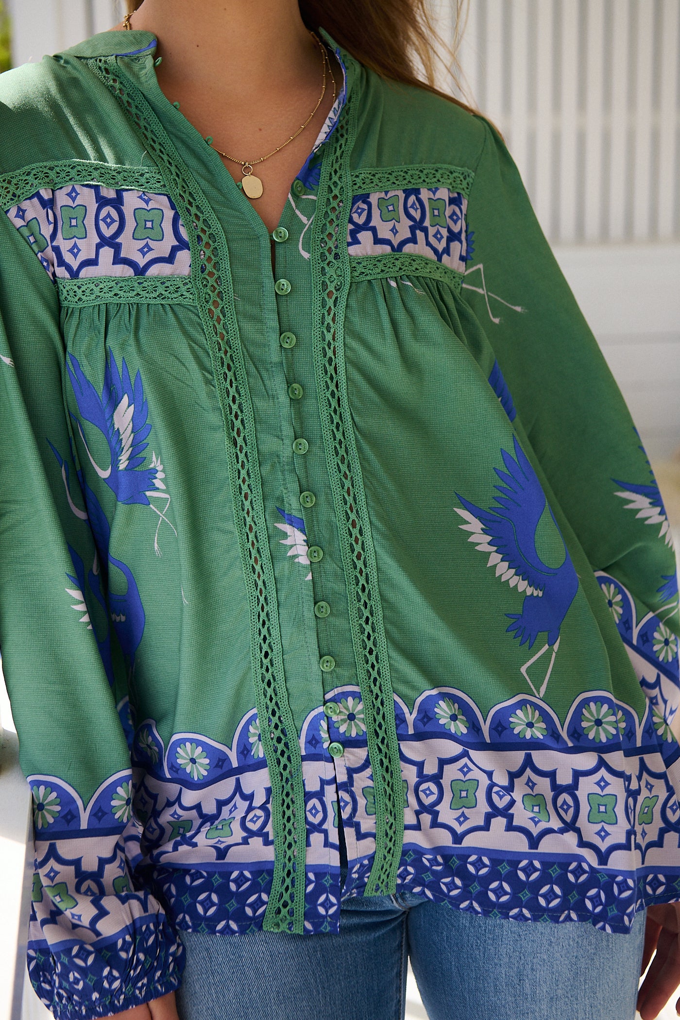 Model wears rayon Boho blouse with vintage print - feminine & effortless