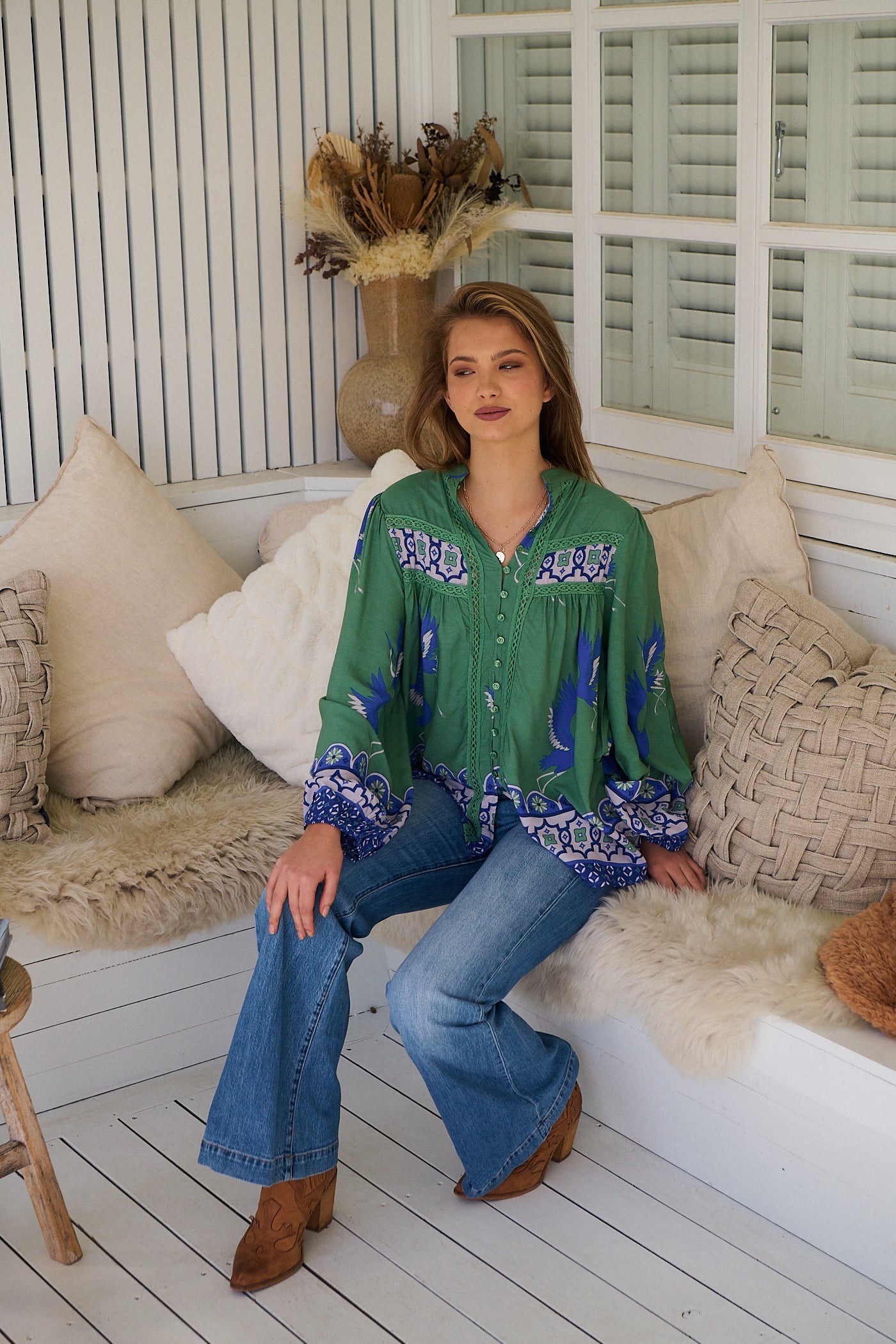 Model wears rayon Boho blouse with vintage print - feminine & effortless