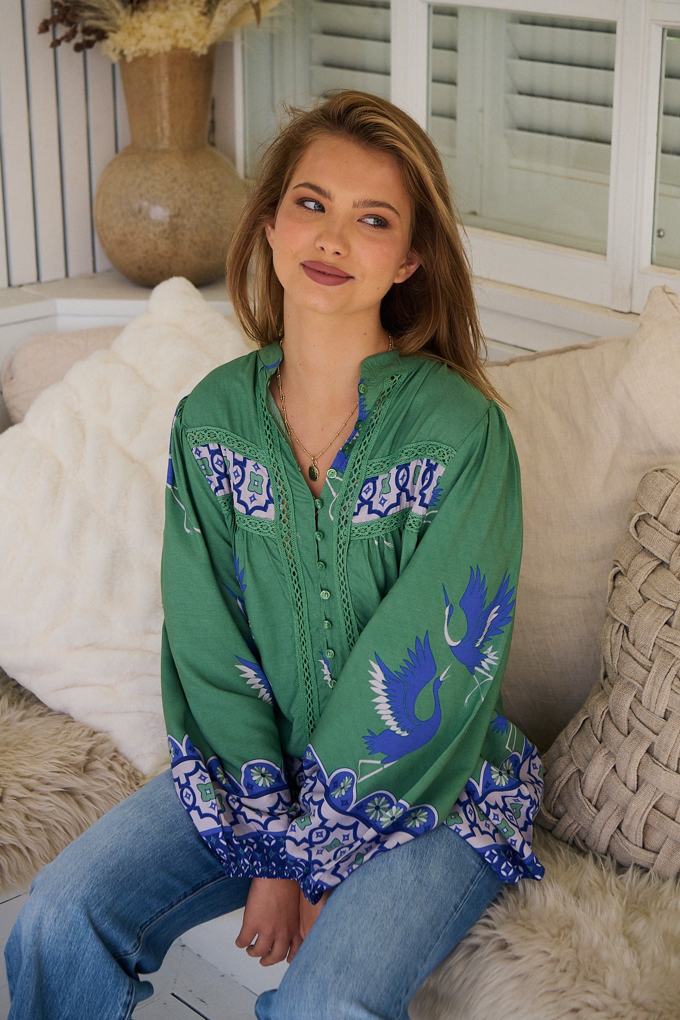 Model wears rayon Boho blouse with vintage print - feminine & effortless