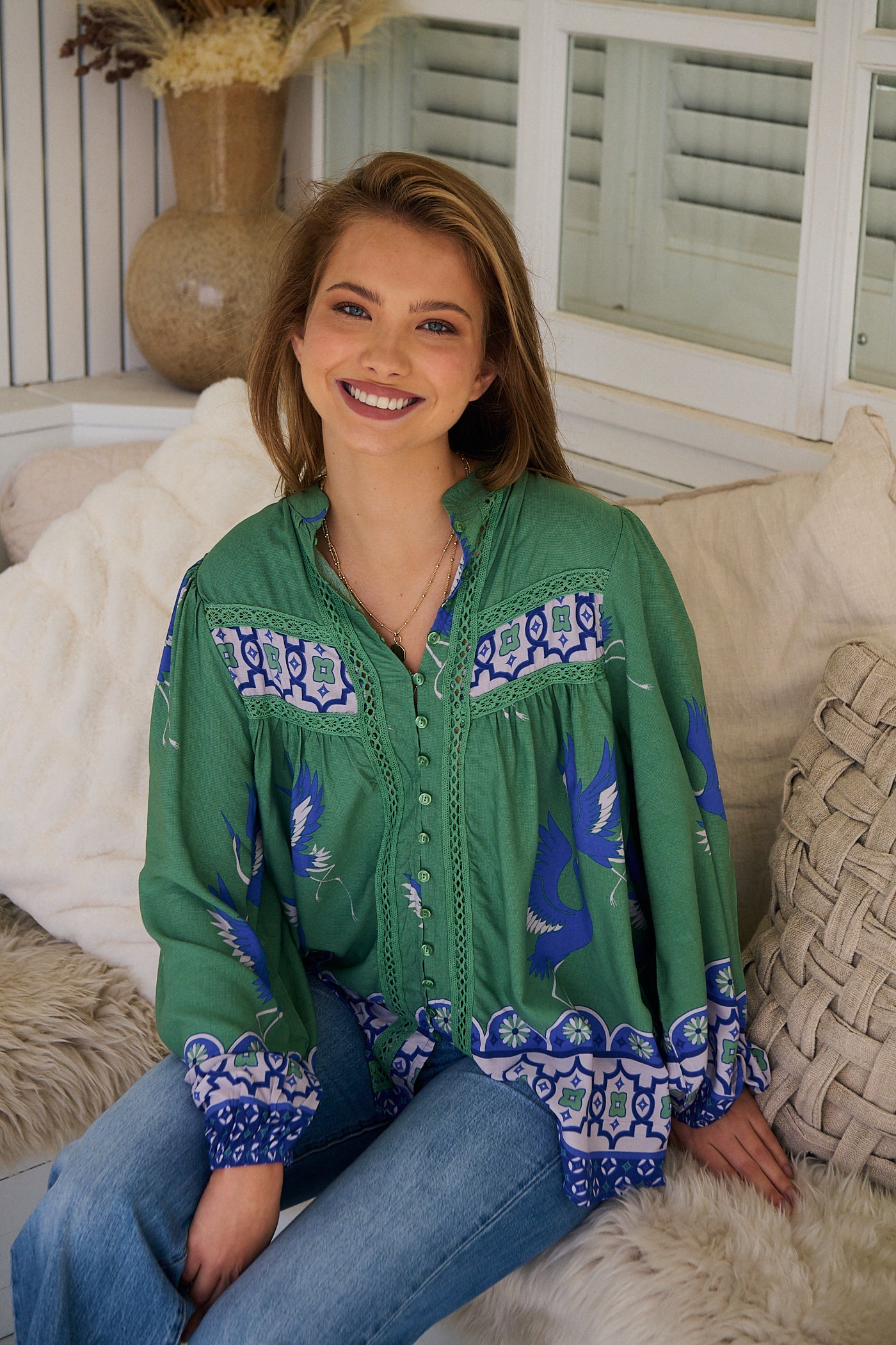 Model wears rayon Boho blouse with vintage print - feminine & effortless