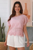 Pink embroidered cotton crochet top with round neck and scalloped lace hem – boho fashion Australia.