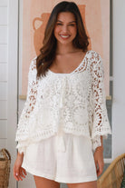 White cotton crochet boho top with bell sleeves, tassel ties and floral lace pattern - The Poet Crochet Bell Sleeve Top
