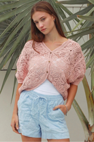 Pink embroidered cotton lace cardigan with V-neckline, button-through front and softly rounded hem