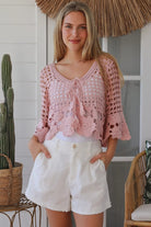 Blush pink cotton crochet boho top with tassel tie neckline and bell sleeves. Breathable 100% cotton by Willow the Label.