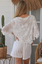 white embroidered cotton and crochet boho top with scalloped sleeves breathable cotton blouse australia