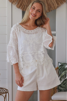 white embroidered cotton and crochet boho top with scalloped sleeves breathable cotton blouse australia