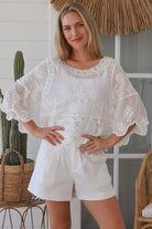 white embroidered cotton and crochet boho top with scalloped sleeves breathable cotton blouse australia