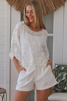 white embroidered cotton and crochet boho top with scalloped sleeves breathable cotton blouse australia
