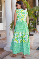 Maruka Green vintage-style tiered cotton maxi dress with sleeveless bodice, V-neckline, mandarin collar and pockets – boho summer style.