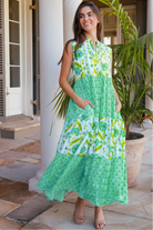 Maruka Green vintage-style tiered cotton maxi dress with sleeveless bodice, V-neckline, mandarin collar and pockets – boho summer style.