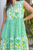 Maruka Green vintage-style tiered cotton maxi dress with sleeveless bodice, V-neckline, mandarin collar and pockets – boho summer style.