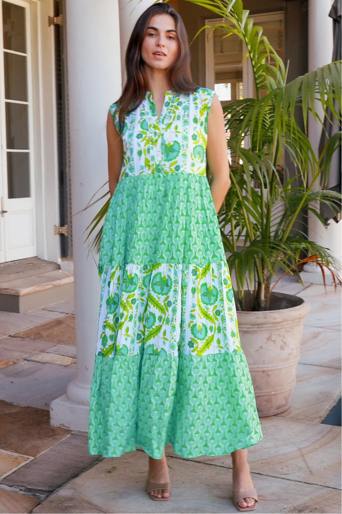 Maruka Green vintage-style tiered cotton maxi dress with sleeveless bodice, V-neckline, mandarin collar and pockets – boho summer style.