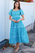 Blue green cotton boho midi dress with off shoulder elastic neckline and white lace inserts Colleton Bohemian Love Runway