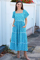 Blue green cotton boho midi dress with off shoulder elastic neckline and white lace inserts Colleton Bohemian Love Runway