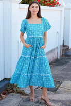 Blue green cotton boho midi dress with off shoulder elastic neckline and white lace inserts Colleton Bohemian Love Runway