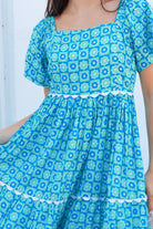 Blue green cotton boho midi dress with off shoulder elastic neckline and white lace inserts Colleton Bohemian Love Runway