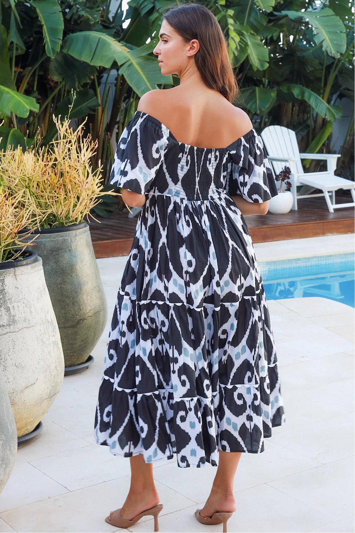 Black ikat boho midi dress worn on or off shoulder with empire waist cotton lace trim tiers and shirred back panel