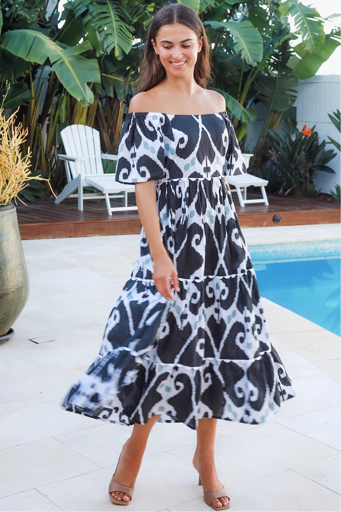 Black ikat boho midi dress worn on or off shoulder with empire waist cotton lace trim tiers and shirred back panel