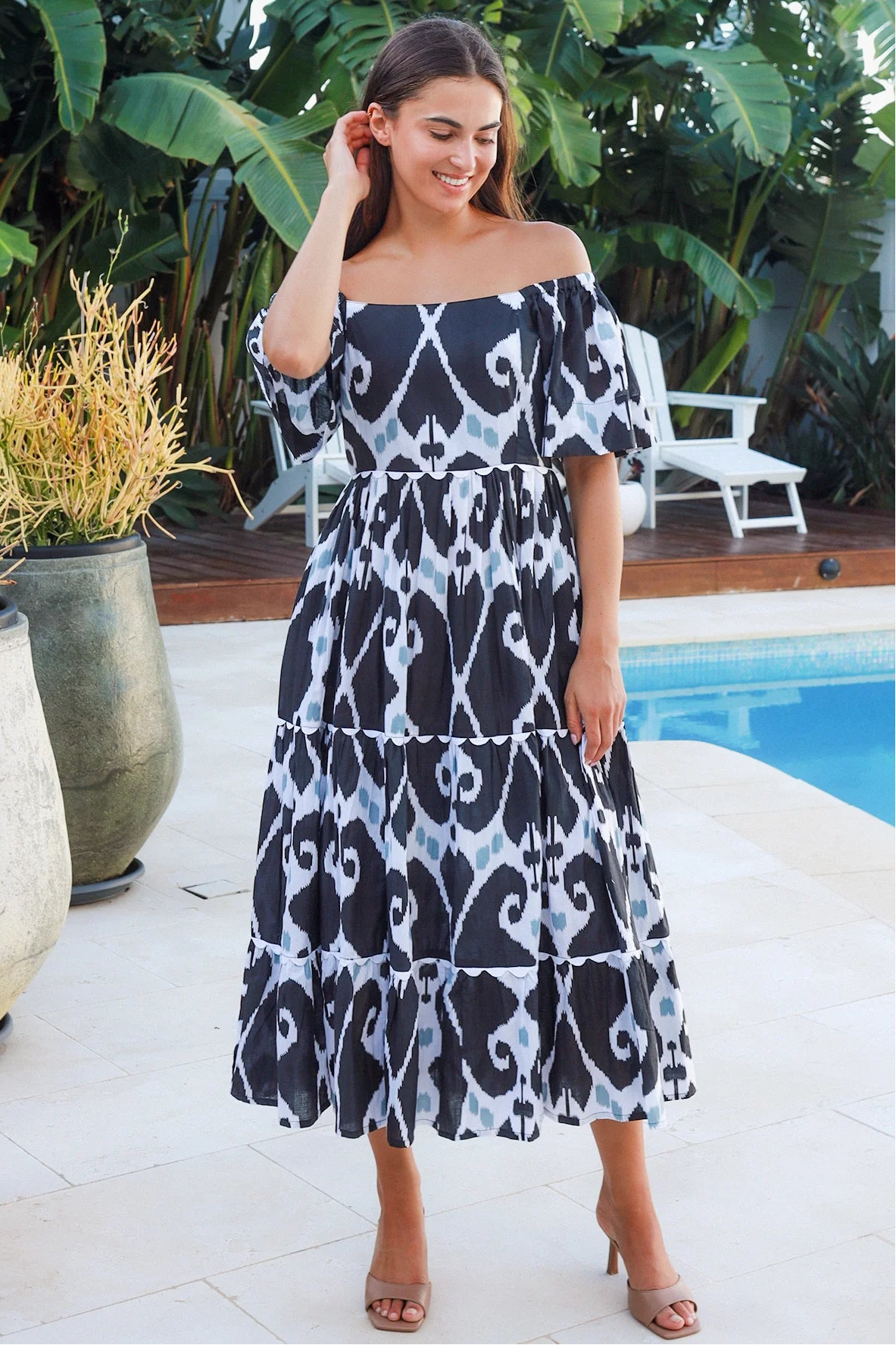 Black ikat boho midi dress worn on or off shoulder with empire waist cotton lace trim tiers and shirred back panel
