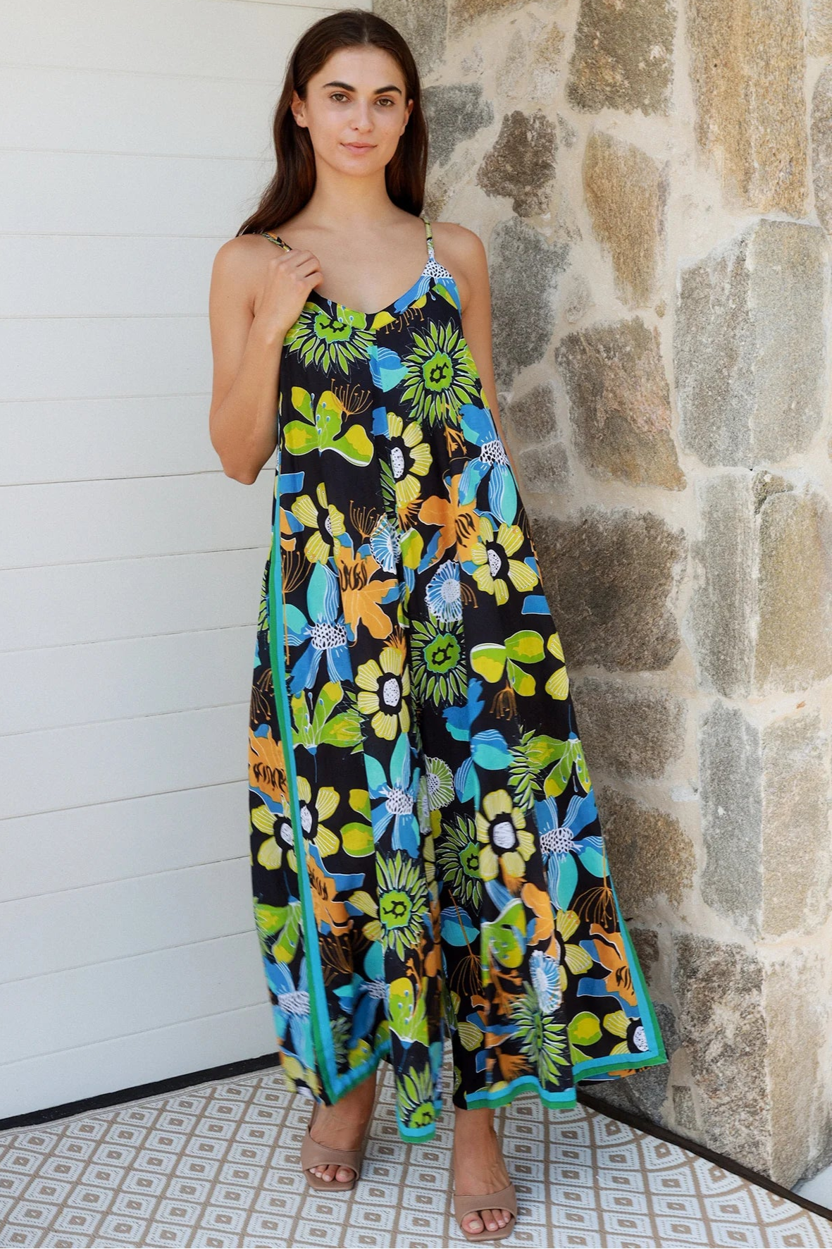 Woman in The Rio Jumpsuit — relaxed wide leg tropical boho jumpsuit with contrast side stripe | Bohemian Love Runway 