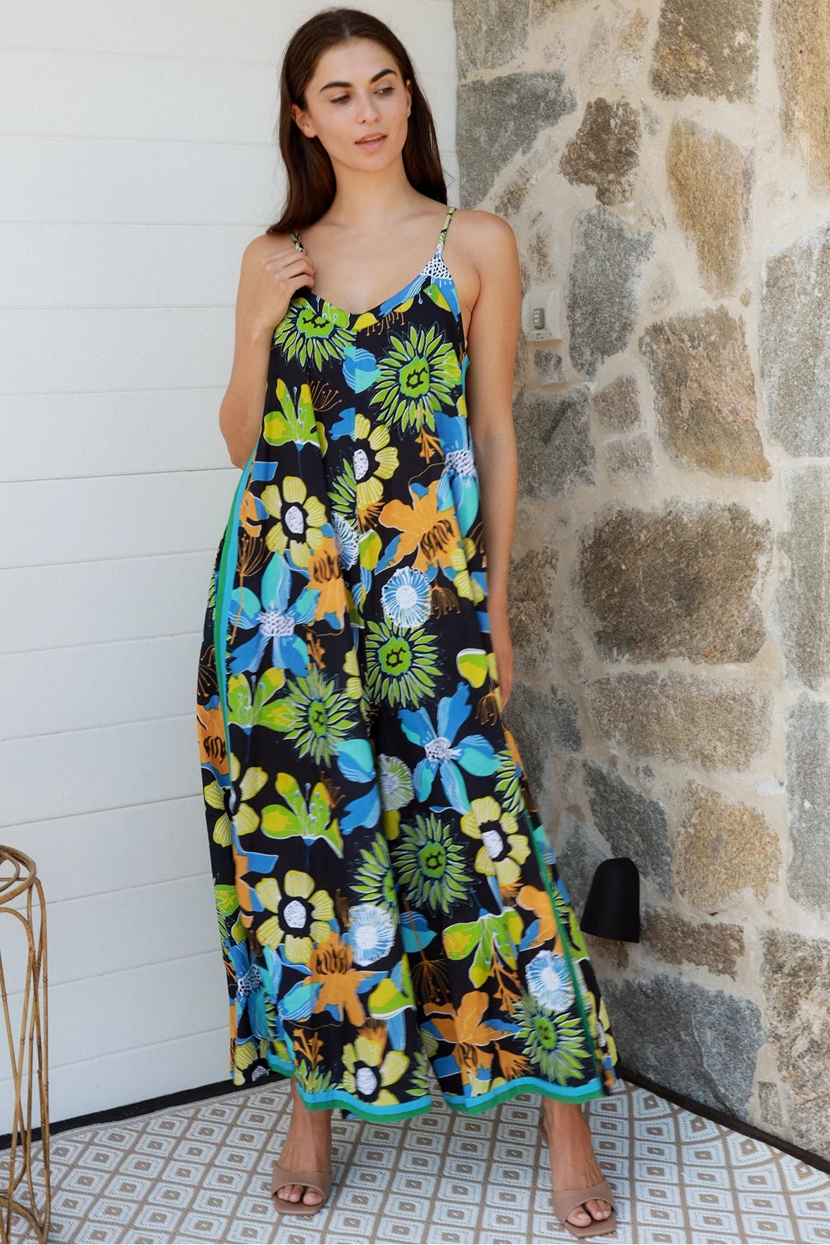 Woman in The Rio Jumpsuit — relaxed wide leg tropical boho jumpsuit with contrast side stripe | Bohemian Love Runway 