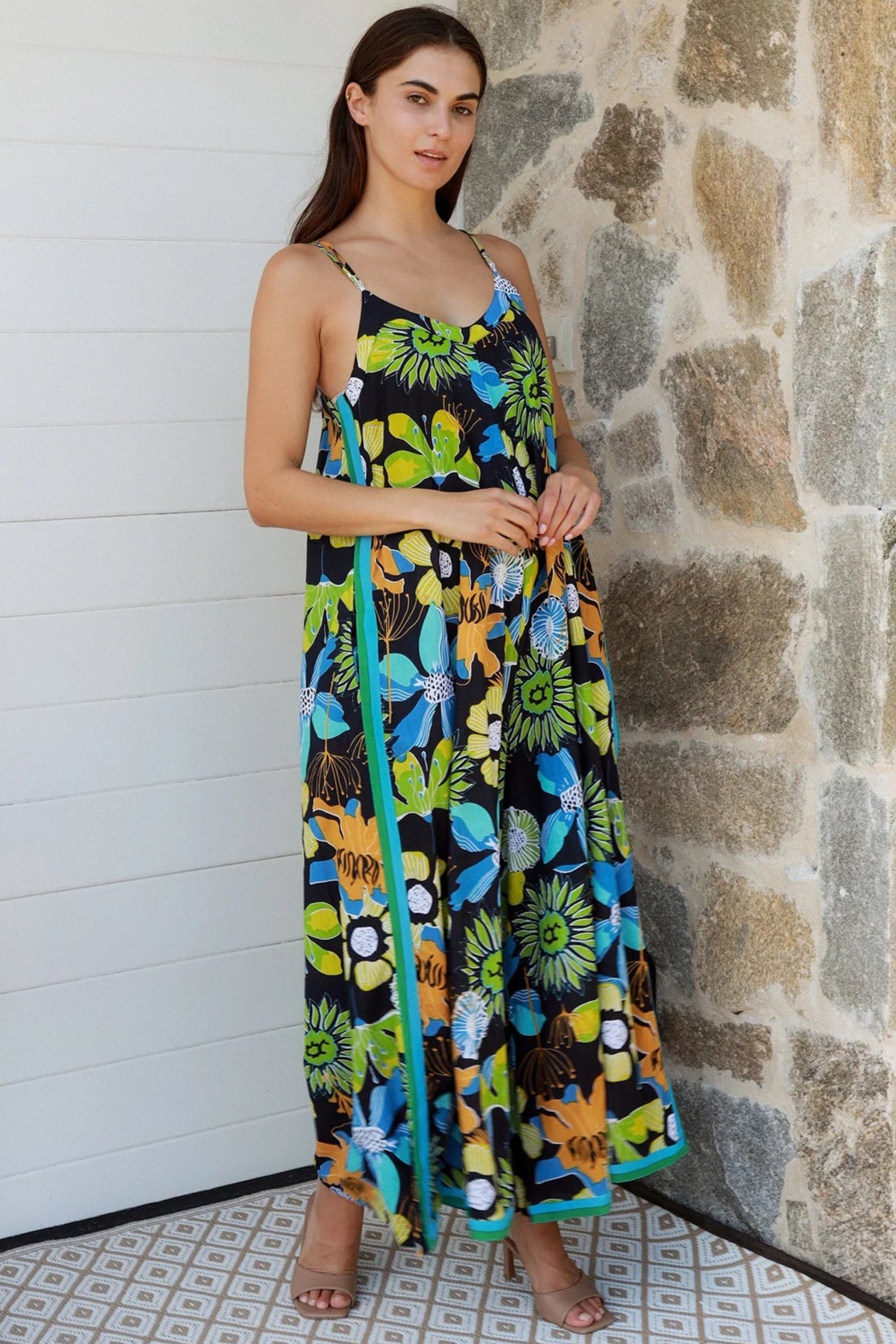 Woman in The Rio Jumpsuit — relaxed wide leg tropical boho jumpsuit with contrast side stripe | Bohemian Love Runway 