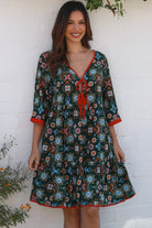 Emily boho mini dress with tie neckline empire waist tiered hem and pockets long sleeve bohemian dress Australia