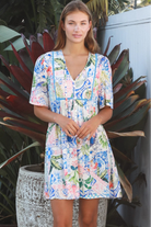 Boho mosaic mini dress with tassel ties and empire-line silhouette in colourful floral print for summer style Australia