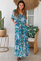Oceane Paisley boho maxi dress in teal with tassel ties, ruched sleeves, oversized tiered skirt, side pockets, relaxed style, 100% rayon