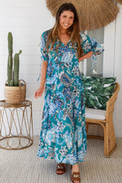 Oceane Paisley boho maxi dress in teal with tassel ties, ruched sleeves, oversized tiered skirt, side pockets, relaxed style, 100% rayon
