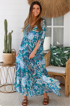Oceane Paisley boho maxi dress in teal with tassel ties, ruched sleeves, oversized tiered skirt, side pockets, relaxed style, 100% rayon