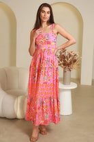 Imogen tiered floral maxi dress in pink bohemian print with fitted bodice, tie back straps and oversized tiered skirt Australia