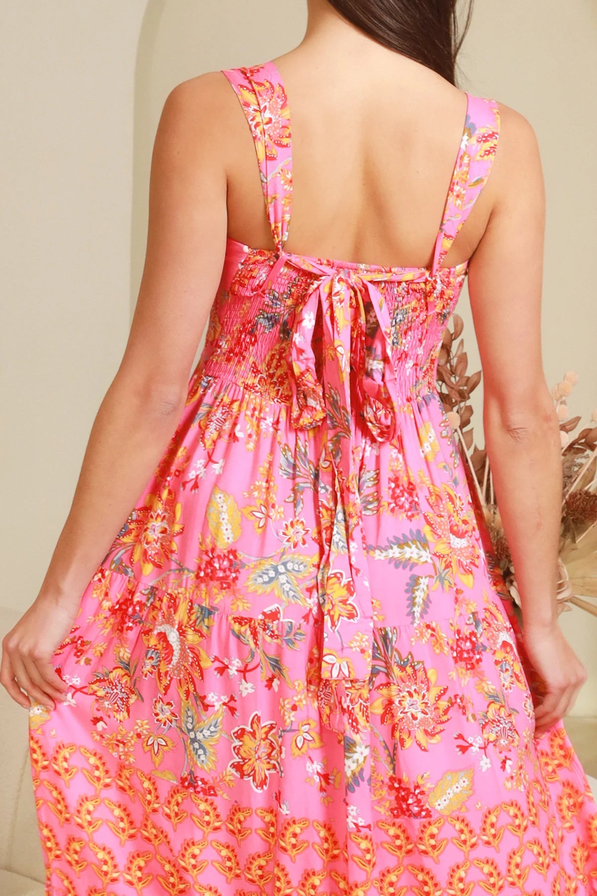 Imogen tiered floral maxi dress in pink bohemian print with fitted bodice, tie back straps and oversized tiered skirt Australia