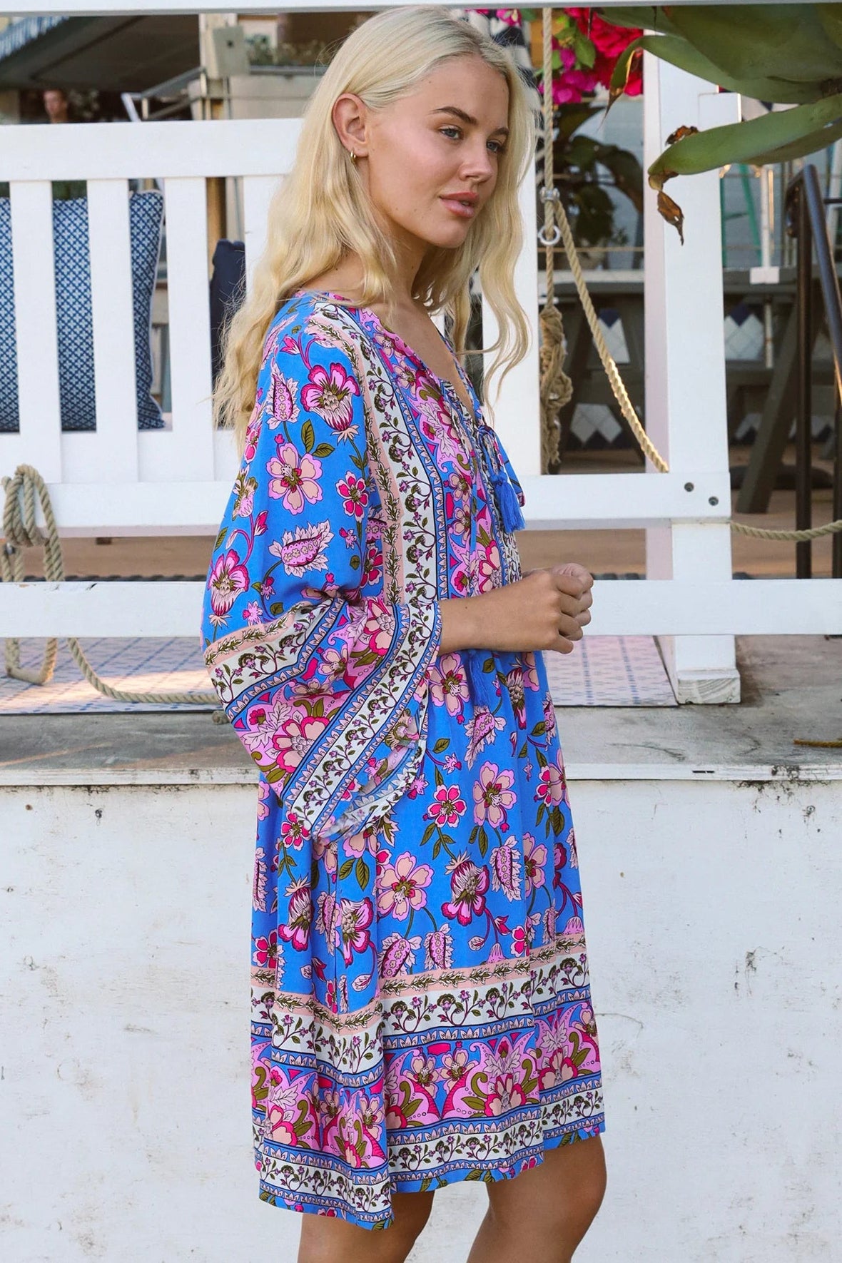 Bluebell riviera mini dress in seaside blue with picturesque florals tassel neckline and bell sleeves - boho mini dress Australia
