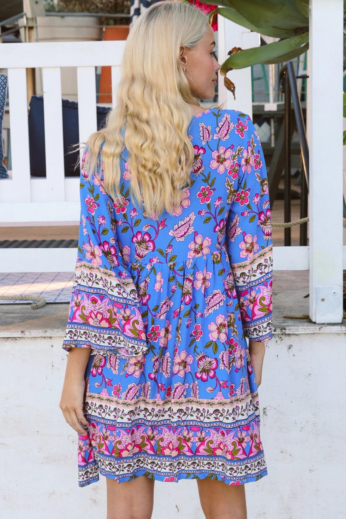 Bluebell riviera mini dress in seaside blue with picturesque florals tassel neckline and bell sleeves - boho mini dress Australia