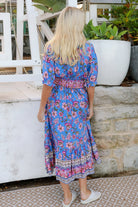 Indigo Periwinkle boho midi dress in rayon with pink and lilac florals and border-print frill hemline - Bluebell Riviera