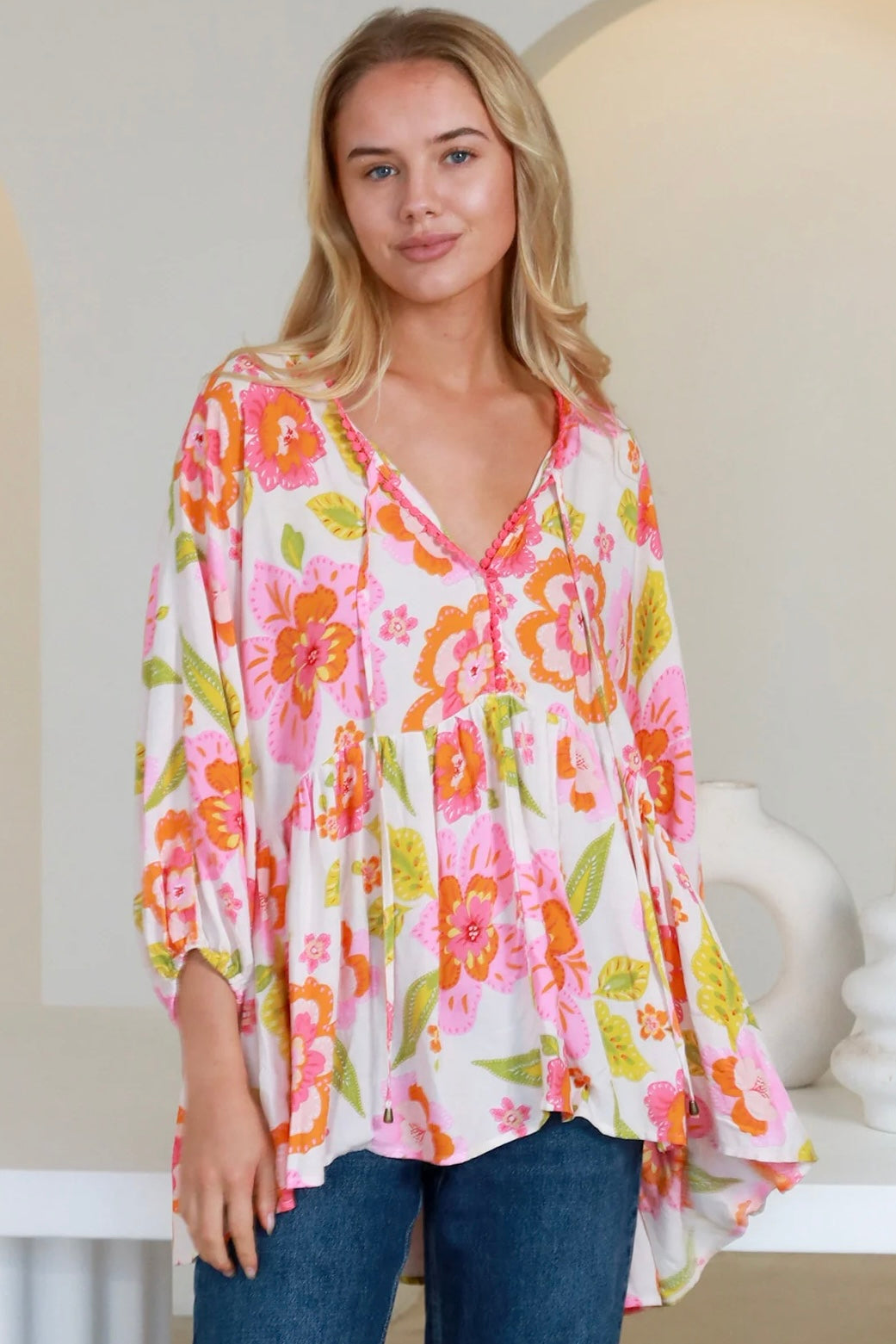 White floral rayon peplum boho blouse with v-neck beaded ties and soft elastic sleeve - The Isla Grace Top