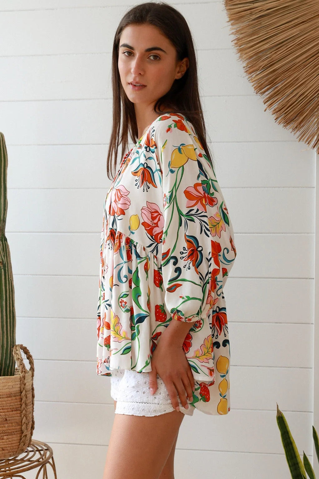 Boho floral print top with red and pink blossoms, relaxed fit, V-neckline with three-quarter sleeves - Australian bohemian fashion