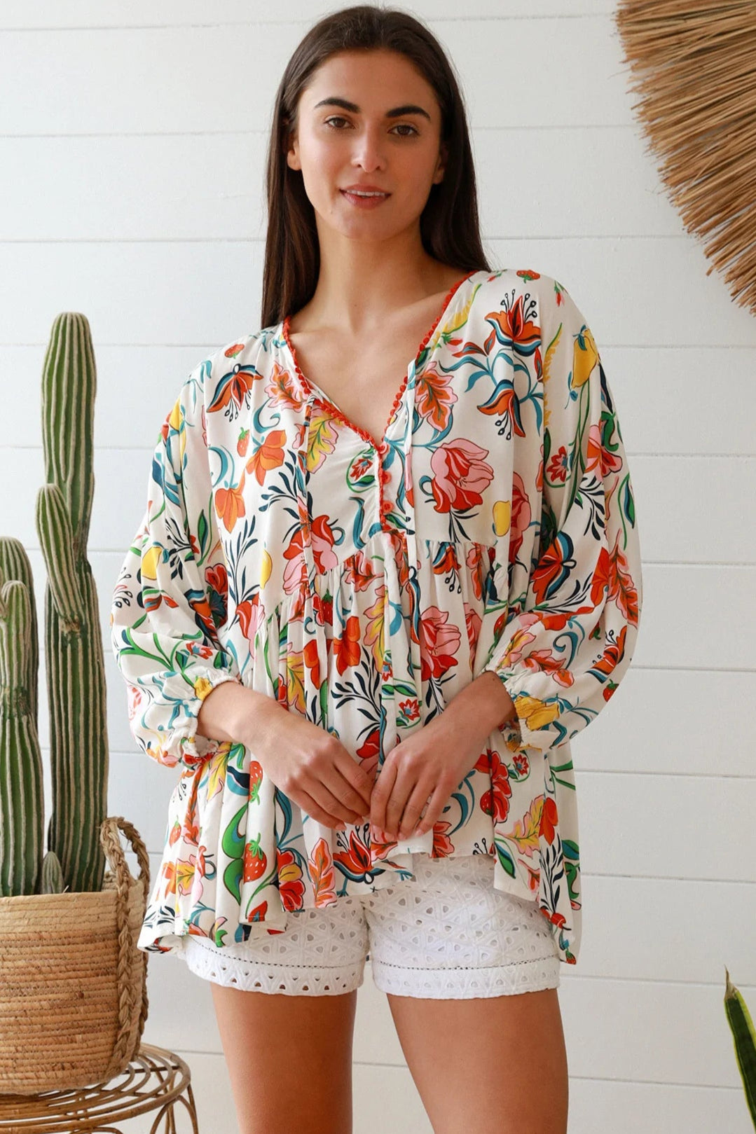 Boho floral print top with red and pink blossoms, relaxed fit, V-neckline with three-quarter sleeves - Australian bohemian fashion
