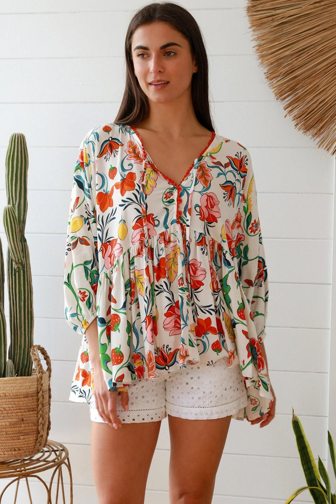 Boho floral print top with red and pink blossoms, relaxed fit, V-neckline with three-quarter sleeves - Australian bohemian fashion