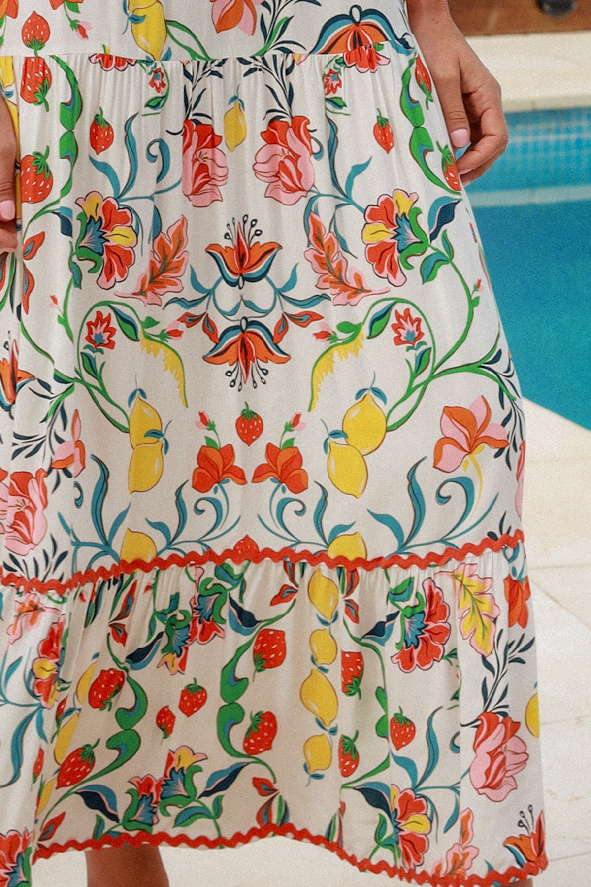 Women in Chiara Floral maxi Dress with strawberry and lemon print, zig-zag lace trim, boho  frill hem - bohemian fashion Australia.