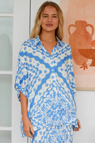 Dreamcatcher Emmy oversized blue floral rayon shirt with button front back yoke pleats and roll-tab sleeve detail