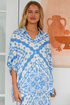 Dreamcatcher Emmy oversized blue floral rayon shirt with button front back yoke pleats and roll-tab sleeve detail